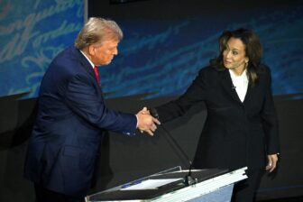 Kamala Harris (R) shakes hands with former US President and Republican presidential candidate Donald Trump during a presidential debate at the National Constitution Center in Philadelphia, Pennsylvania, on September 10, 2024.