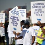 Dockworkers strike at the Bayport Container Terminal in Seabrook, Texas, on October 1, 2024.