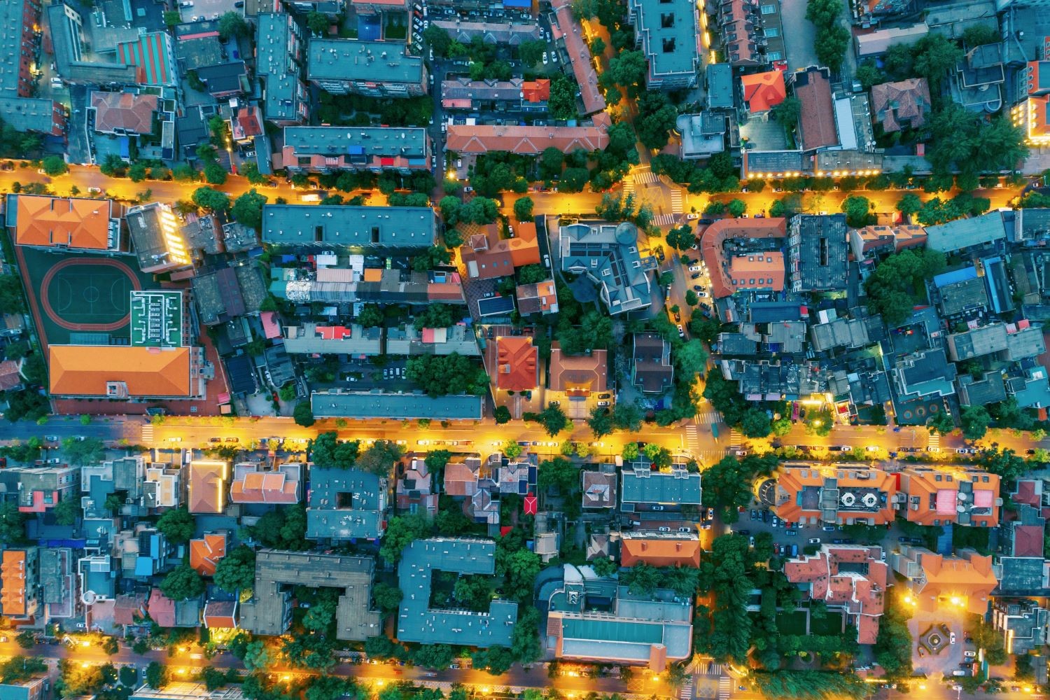 An aerial shot of apartment complexes in a city.