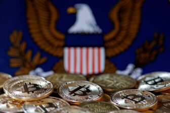 Gold coins in front of the SEC logo