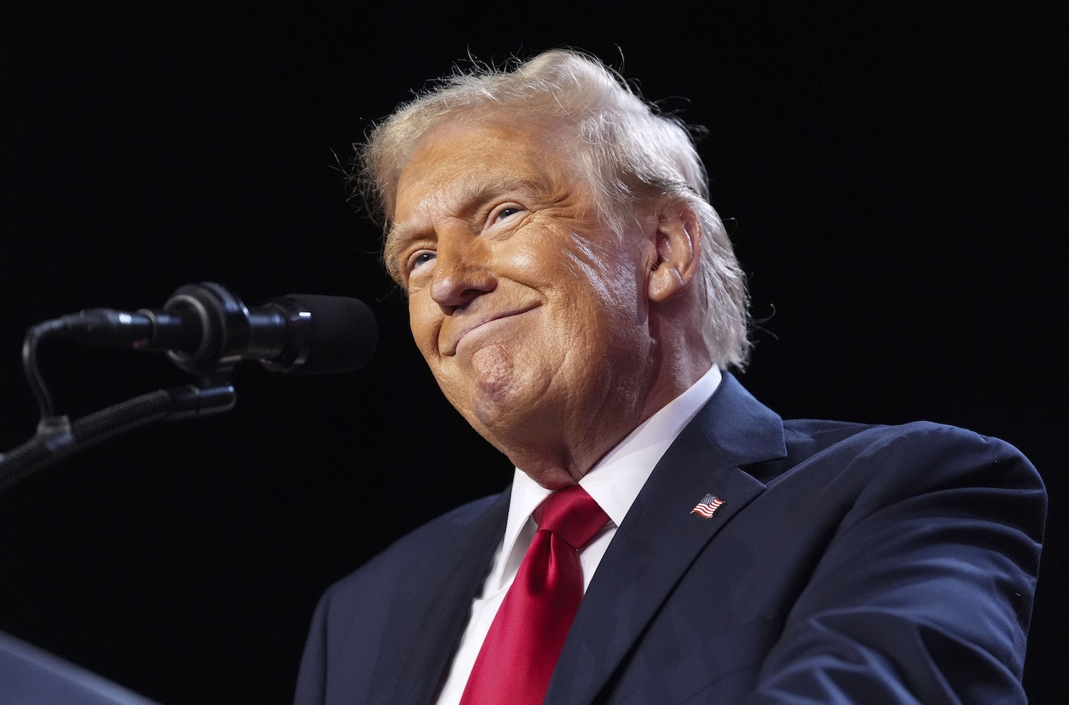 Donald Trump addresses the crowd during an election night party at the Palm Beach County Convention Center in West Palm Beach, Florida on November 6, 2024.