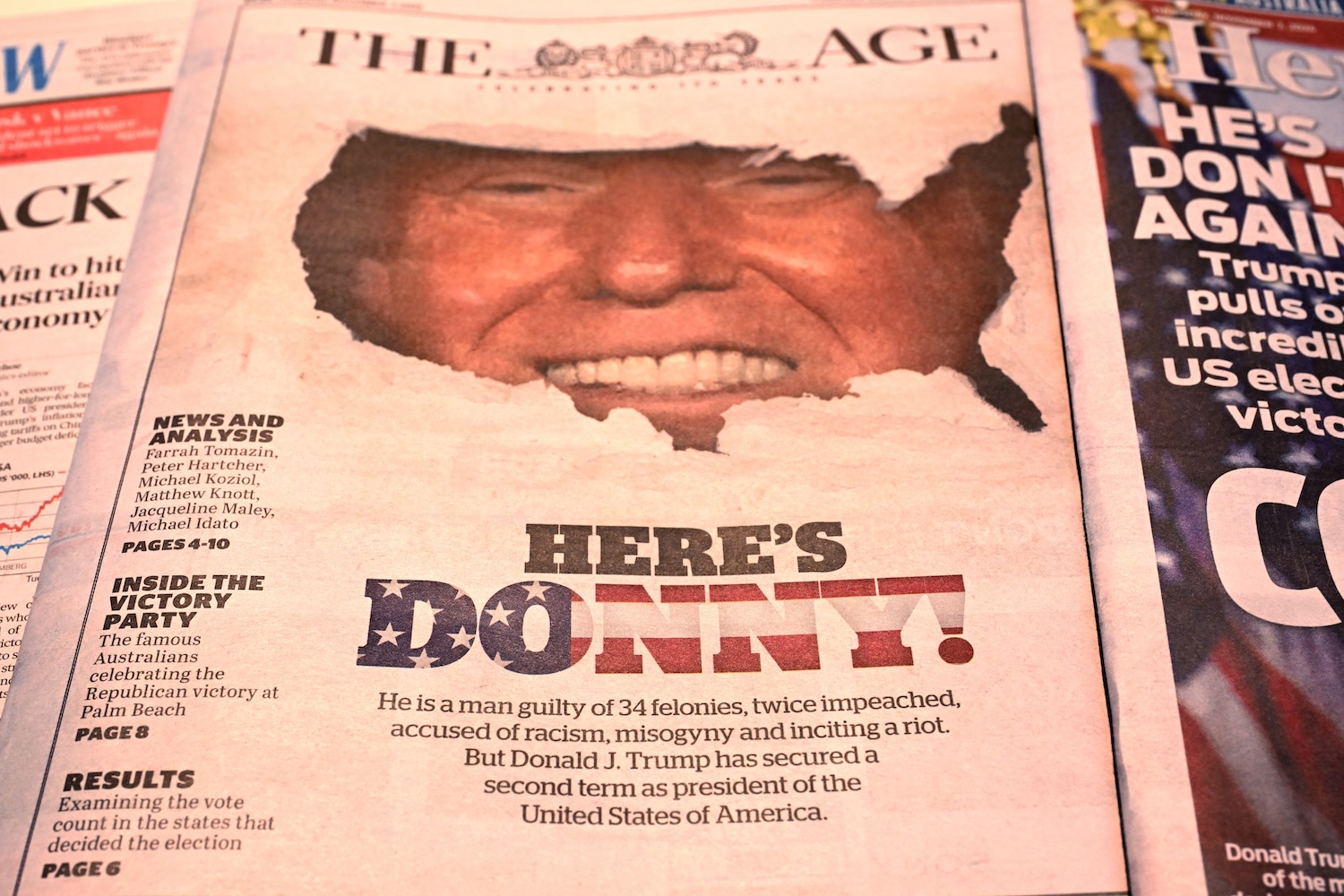 The front pages of the morning newspapers in Melbourne on November 7, 2024, show the reaction to the re-election of Donald Trump