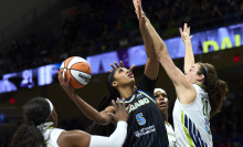 Angel Reese of the Chicago Sky jumps for the basket