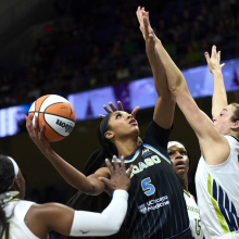 Angel Reese of the Chicago Sky jumps for the basket