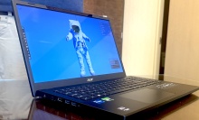 Aspire 3D 15 SpatialLabs laptop on a table with astronaut on the display