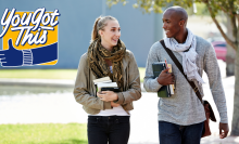 African American boy and white girl at college - stock photo