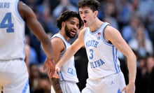 RJ Davis and Cormac Ryan of the North Carolina Tar Heels react during the second half of the game against the Wake Forest Demon Deacons at the Dean E. Smith Center on January 22, 2024, in Chapel Hill, North Carolina.