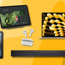 Fire tablet, Google Pixel tablet, Bose soundbar, Echo Buds, and MacBook Air with yellow background