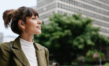 woman wearing Samsung galaxy earbuds 