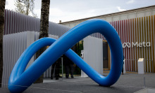 The Meta Platforms Inc. pavilion and logo on the opening day of the World Economic Forum (WEF).