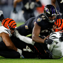 oe Burrow of the Cincinnati Bengals is sacked by the Ravens