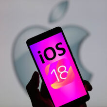 iOS 18 logo on iPhone screen