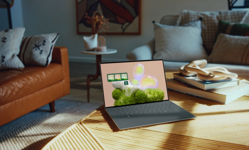 a dell xps 13 laptop on a coffee table in a living room