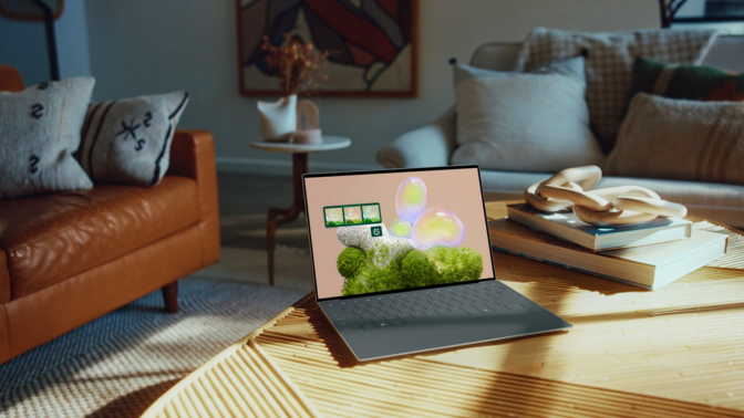 a dell xps 13 laptop on a coffee table in a living room