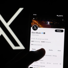 Elon Musk account on Twitter X is displayed on a smartphone