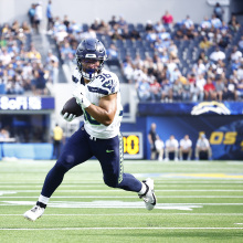 George Holani of the Seattle Seahawks scores a touchdown