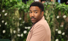 Donald glover posing for a camera