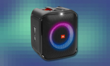 JBL Partybox Encore Essential speaker on abstract pixelated background
