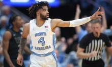 North Carolina Tar Heels guard RJ Davis (4) signals after a 3-point basket during the college basketball game between the North Carolina Tar Heels and the Virginia Tech Hokies on Feb. 17, 2024, at the Dean Smith Center in Chapel Hill, North Carolina.