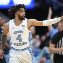 North Carolina Tar Heels guard RJ Davis (4) signals after a 3-point basket during the college basketball game between the North Carolina Tar Heels and the Virginia Tech Hokies on Feb. 17, 2024, at the Dean Smith Center in Chapel Hill, North Carolina.