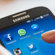 Icon of Facebook, WhatsApp and Messenger (Facebook's proprietary messaging app) alongside other social media apps on a Samsung Galaxy smartphone's touchscreen.