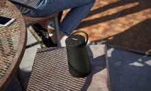 Bose SoundLink Revolve+ portable speaker outside on patio