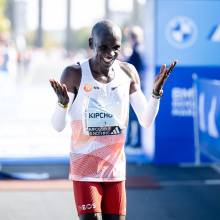 Eliud Kipchoge celebrates as first male finisher during the 2023 BMW Berlin-Marathon 