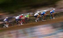 Cyclists compete in the Men's cycling road race final