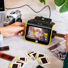 photographer using kodak film scanner