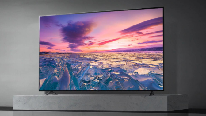 LG TV with water and sunset on screen