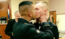 Married military couple's first kiss romances the cold Internet