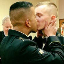 Married military couple's first kiss romances the cold Internet