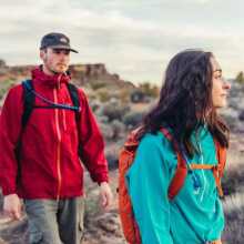 Two hikers wear Gregory backpacks 