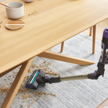 shark powerdetect cordless vacuum bending in middle to reach under table