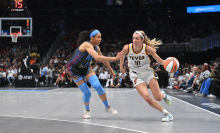 Lexie Hull #10 of the Indiana Fever drives to the basket 