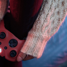 a person holding an xbox controller