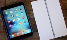 Refurbished 2015 Apple iPad Mini 4 on a table.