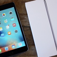 Refurbished 2015 Apple iPad Mini 4 on a table.