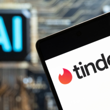 Tinder logo seen displayed on a smartphone with an Artificial intelligence (AI) chip and symbol in the background