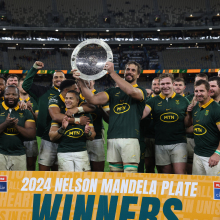 South Africa's Salmaan Moerat holds the Nelson Mandela Plate