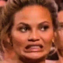 Chrissy Teigen's face at the Oscars is all of us