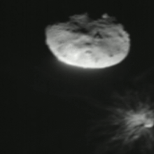 An image snapped by the LICIACube spacecraft as NASA's DART mission impacted the asteroid Dimorphos (on bottom right).