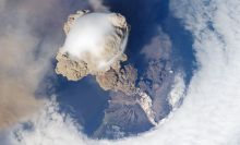 The Sarychev volcano in Russia erupting, as seen from the International Space Station. (It's not a supervolcano; such an eruption hasn't happened in modern history.)