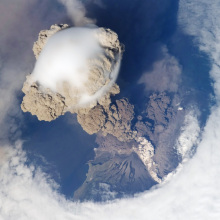 The Sarychev volcano in Russia erupting, as seen from the International Space Station. (It's not a supervolcano; such an eruption hasn't happened in modern history.)