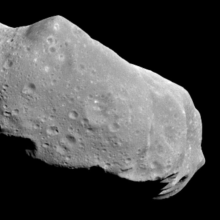 The asteroid 243 Ida and its small moon as imaged by NASA's Galileo spacecraft in August 1993.