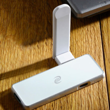 Silver VPN hardware piece with white plug-in