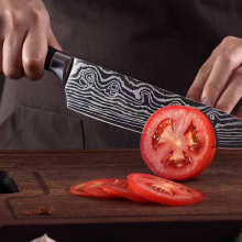 a chef cutting veggies