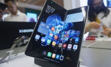 Mi MIXFold4 foldable phone on display in China