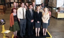 The cast of "The Office" in a paper warehouse.