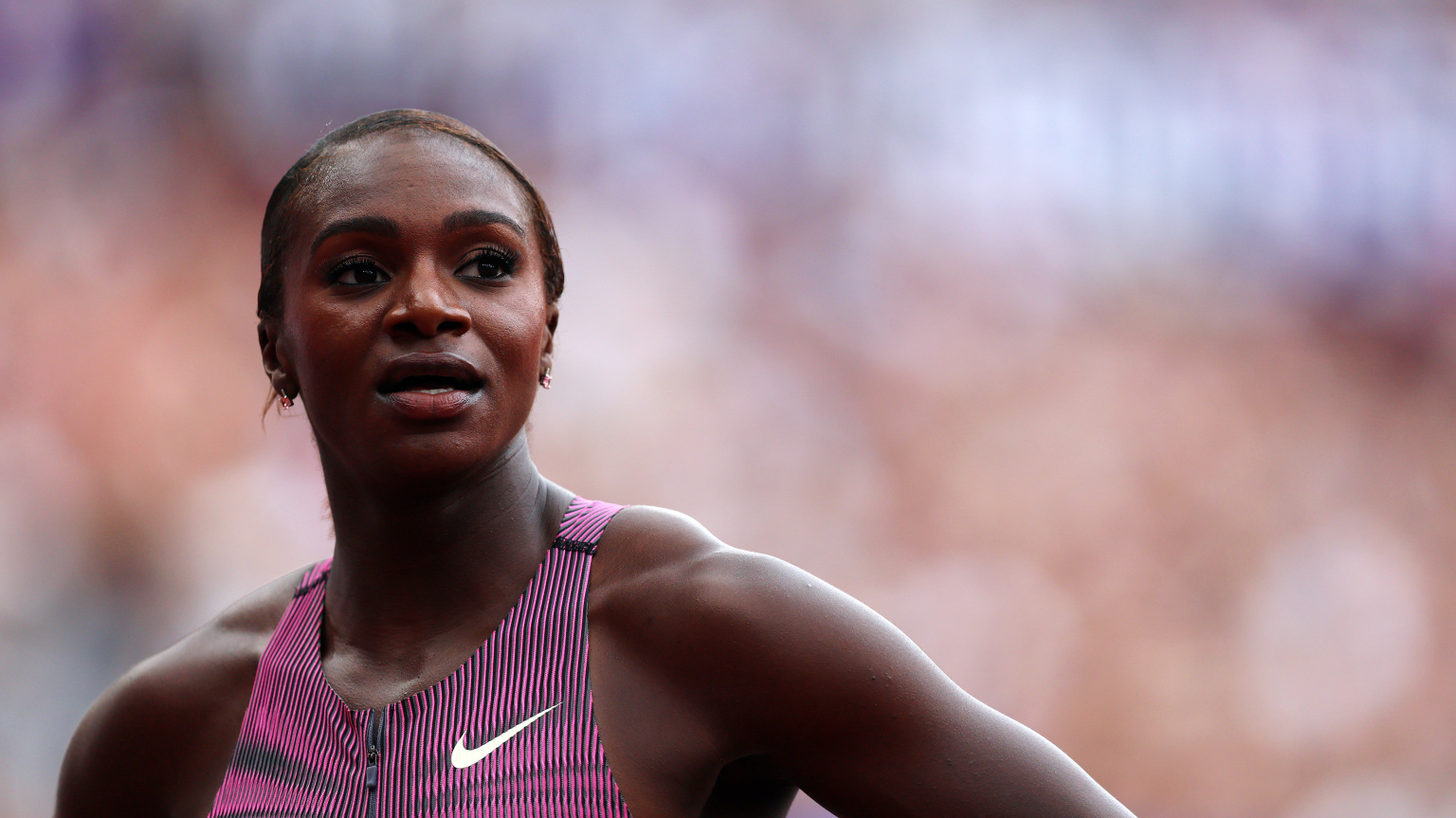 Dina Asher-Smith of Great Britain looks on